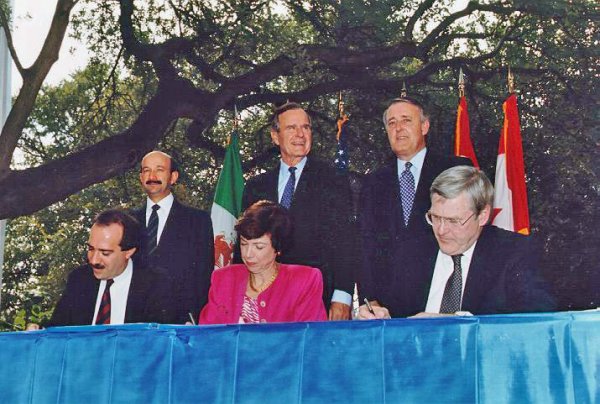 Image: Photograph taken at the NAFTA initialing ceremony in 1992. From the Wikimedia Commons.